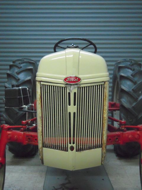 Photo of 8N grill being fitted in shop